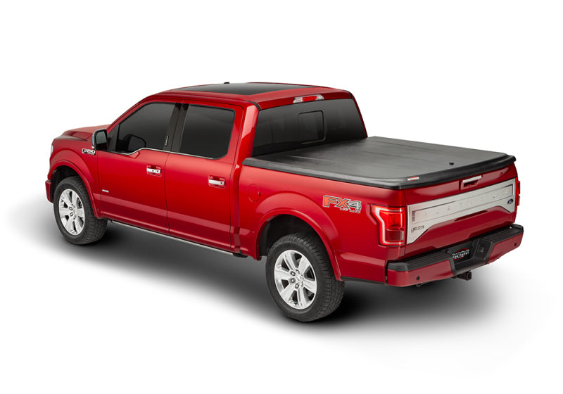 UnderCover 05-15 Toyota Tacoma 5ft SE Bed Cover Black Textured (Req Factory Deck Rails) UC4056