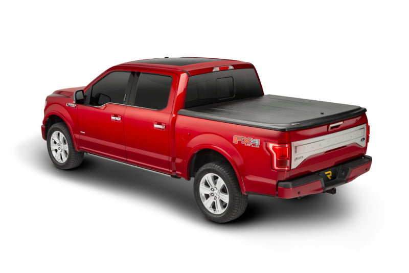 UnderCover 05-15 Toyota Tacoma 6ft SE Bed Cover Black Textured (Req Factory Deck Rails) UC4066