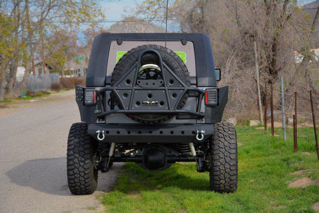 Dv8 Offroad Spare Tire Carrier For 2007-2018 Jeep Wrangler Jk Mounts To Body Mounts Up To 42" Spare Tire Works With Any Rear Bumper Fits Any Bolt Pattern Wheel Drilling Required TCSTTB-01